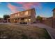 Spacious backyard with covered patio is perfect for outdoor living and entertaining at 7616 S Sorrell Ln, Gilbert, AZ 85298