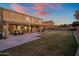 Expansive backyard with covered patio is perfect for outdoor entertaining and relaxation at 7616 S Sorrell Ln, Gilbert, AZ 85298