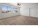 Spacious bedroom with plush carpet, filled with natural light from the large window at 7616 S Sorrell Ln, Gilbert, AZ 85298