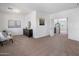 Spacious and well-lit bonus room with neutral walls and carpet, perfect for versatile use at 7616 S Sorrell Ln, Gilbert, AZ 85298