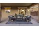 Cozy covered patio with comfortable seating and stylish decor at 7616 S Sorrell Ln, Gilbert, AZ 85298