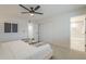 Bright bedroom with a view into the en suite bathroom, lots of natural light and spacious closet at 906 Leisure World --, Mesa, AZ 85206