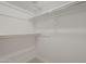 Walk in closet featuring metal rack shelving and carpet floors at 906 Leisure World --, Mesa, AZ 85206