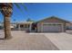 Charming single-story home featuring desert landscaping, a covered front patio, and an attached two-car garage at 906 Leisure World --, Mesa, AZ 85206