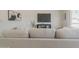Relaxing living room featuring a comfortable sofa with neutral decor at 906 Leisure World --, Mesa, AZ 85206