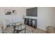 Bright living room featuring a modern entertainment center and stylish decor at 906 Leisure World --, Mesa, AZ 85206