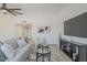 Cozy living room showcasing a plush sofa and stylish, modern furnishings at 906 Leisure World --, Mesa, AZ 85206