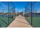 View through the gated entrance of a series of tennis courts, offering a variety of court options at 906 Leisure World --, Mesa, AZ 85206