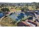 Overhead view of tennis courts surrounded by lush greenery and well-manicured landscaping at 906 Leisure World --, Mesa, AZ 85206