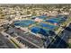 Aerial view of tennis courts highlighting the well-maintained facilities and parking for residents in the area at 906 Leisure World --, Mesa, AZ 85206
