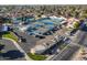Aerial view of multiple well-maintained tennis courts and a community area with nearby parking for easy access at 906 Leisure World --, Mesa, AZ 85206