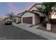 A pleasing street view of the home featuring desert landscaping at 10225 W Camelback Rd # 33, Phoenix, AZ 85037