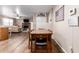 Inviting dining area featuring a wooden table, tile floors, and stylish decor at 1263 W Del Rio St, Chandler, AZ 85224