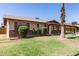 Single-story home featuring a combination of brick and siding, complemented by well-maintained landscaping at 1263 W Del Rio St, Chandler, AZ 85224
