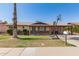 Charming single-story home with brick accents, desert landscaping, and a driveway with basketball hoop at 1263 W Del Rio St, Chandler, AZ 85224