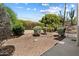 Backyard with desert landscaping, a stone ground cover, and a patio with a covered walkway at 12642 N Mountainside Dr # D, Fountain Hills, AZ 85268