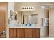 Bathroom features a large mirror, cabinets, and a separate room with a shower at 12642 N Mountainside Dr # D, Fountain Hills, AZ 85268