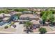Beautiful two-story home with a tile roof, landscaped yard, a boat, and a three-car garage in an aerial view at 14161 W Poinsettia Dr, Surprise, AZ 85379