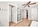 Bathroom with multiple entry ways, walk in closet, and standalone shower at 14161 W Poinsettia Dr, Surprise, AZ 85379