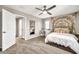 Bedroom featuring a patterned wall hanging and a stylish vanity area at 14161 W Poinsettia Dr, Surprise, AZ 85379
