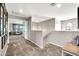 Upstairs hallway provides carpeted access to bedrooms and seating area at 14161 W Poinsettia Dr, Surprise, AZ 85379