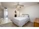 Inviting bedroom featuring a spacious closet, soft lighting, and neutral decor at 1454 W Capri Ave, Mesa, AZ 85202