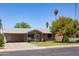 Attractive single-story home with covered parking and well-maintained front yard at 1454 W Capri Ave, Mesa, AZ 85202