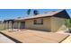 Backyard with a covered pool, exterior window, and fenced yard at 15602 N 55Th Ave, Glendale, AZ 85306