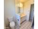 The bathroom vanity features an undermount sink, toilet, and tile floors at 15602 N 55Th Ave, Glendale, AZ 85306
