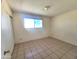 View of a bedroom showcasing a window that provides natural lighting at 15602 N 55Th Ave, Glendale, AZ 85306
