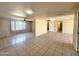Spacious living room featuring tile floors and natural light at 15602 N 55Th Ave, Glendale, AZ 85306