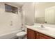 Bathroom featuring a shower and tub combination and vanity with a white sink at 17419 W Elaine Dr, Goodyear, AZ 85338