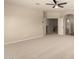 Spacious bedroom featuring neutral walls, carpeted flooring, and a ceiling fan for added comfort at 17419 W Elaine Dr, Goodyear, AZ 85338