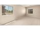 Sunlit bedroom with a large window and tiled roof views at 17419 W Elaine Dr, Goodyear, AZ 85338