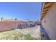 Concrete backyard with a mix of concrete and grass at 1911 N 42Nd Ave, Phoenix, AZ 85009