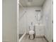 Bathroom with a new shower, stylish vanity, tiled floors, and modern fixtures at 1911 N 42Nd Ave, Phoenix, AZ 85009