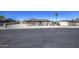 Charming single-story home with a brown tile roof, desert landscaping, and a secure front fence at 1911 N 42Nd Ave, Phoenix, AZ 85009