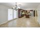 Expansive kitchen with granite counters, stainless appliances, center island, and adjacent dining area at 1911 N 42Nd Ave, Phoenix, AZ 85009