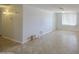 Open concept living room with tile floors, neutral walls, and recessed lighting at 1911 N 42Nd Ave, Phoenix, AZ 85009