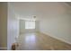 Light and airy living room featuring neutral walls, tile flooring, and a ceiling fan at 1911 N 42Nd Ave, Phoenix, AZ 85009
