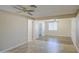 Inviting living room with tile transitioning to wood flooring and neutral color scheme at 1911 N 42Nd Ave, Phoenix, AZ 85009