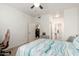 Bedroom with carpet, a ceiling fan, attached bathroom, and a walk-in closet at 1941 S Pierpont Dr # 1037, Mesa, AZ 85206