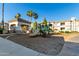 Multi-colored playground featuring two slides and a canopy for shade surrounded by apartment buildings at 1941 S Pierpont Dr # 1037, Mesa, AZ 85206