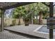 Backyard with a fire pit, palm trees, and a pool for enjoying outdoor relaxation and entertainment at 1953 E Lafayette Ave, Gilbert, AZ 85298