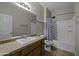 Full bathroom featuring a vanity with countertop, toilet, and a shower-tub combination with a decorative curtain at 1953 E Lafayette Ave, Gilbert, AZ 85298