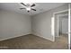 Bedroom showcases neutral walls, ceiling fan, and window for natural light at 1953 E Lafayette Ave, Gilbert, AZ 85298