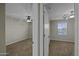 Bedroom showcases neutral walls, carpet, ceiling fan, and bright window at 1953 E Lafayette Ave, Gilbert, AZ 85298