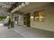 Spacious covered patio with a hanging swing bed and a cozy outdoor living space at 1953 E Lafayette Ave, Gilbert, AZ 85298