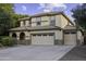Charming home with a spacious 3-car garage, covered entryway, and meticulously kept landscaping at 1953 E Lafayette Ave, Gilbert, AZ 85298