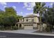 Well-maintained two-story home with a tile roof, desert landscaping, and a multi-car garage at 1953 E Lafayette Ave, Gilbert, AZ 85298